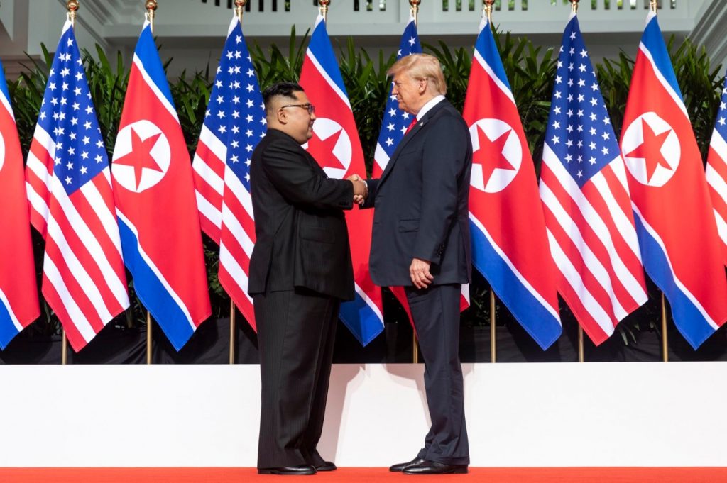 Kim And Trump Shaking Hands At The Red Carpet During The Dprk–usa Singapore Summit Meetings History Meeting Room Management System Most Bizarre Meetings In History