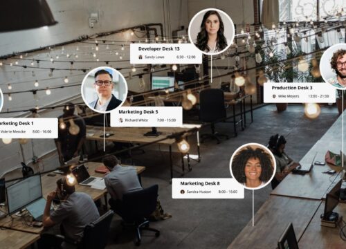 Joan desk booking interface overlaid on an open-plan office showing five employees assigned to named desks with time slots.