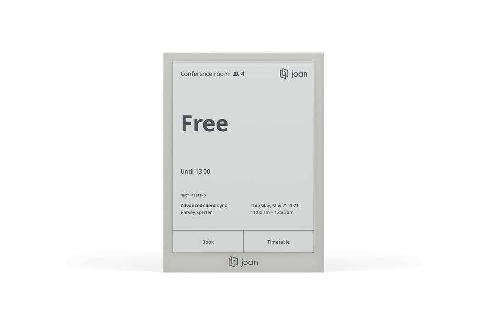Joan 6 Pro e-ink display showing a meeting room marked as Free on its scheduling screen.