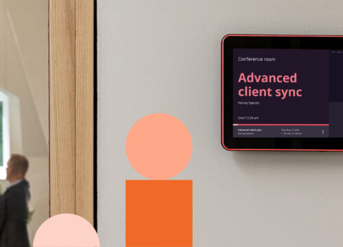 Joan room scheduling display mounted on a wall showing an 'Advanced client sync' meeting booking interface.
