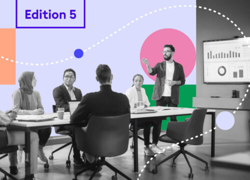 Diverse team in a meeting room with a presenter at a screen, overlaid with 'Edition 5' graphic branding.