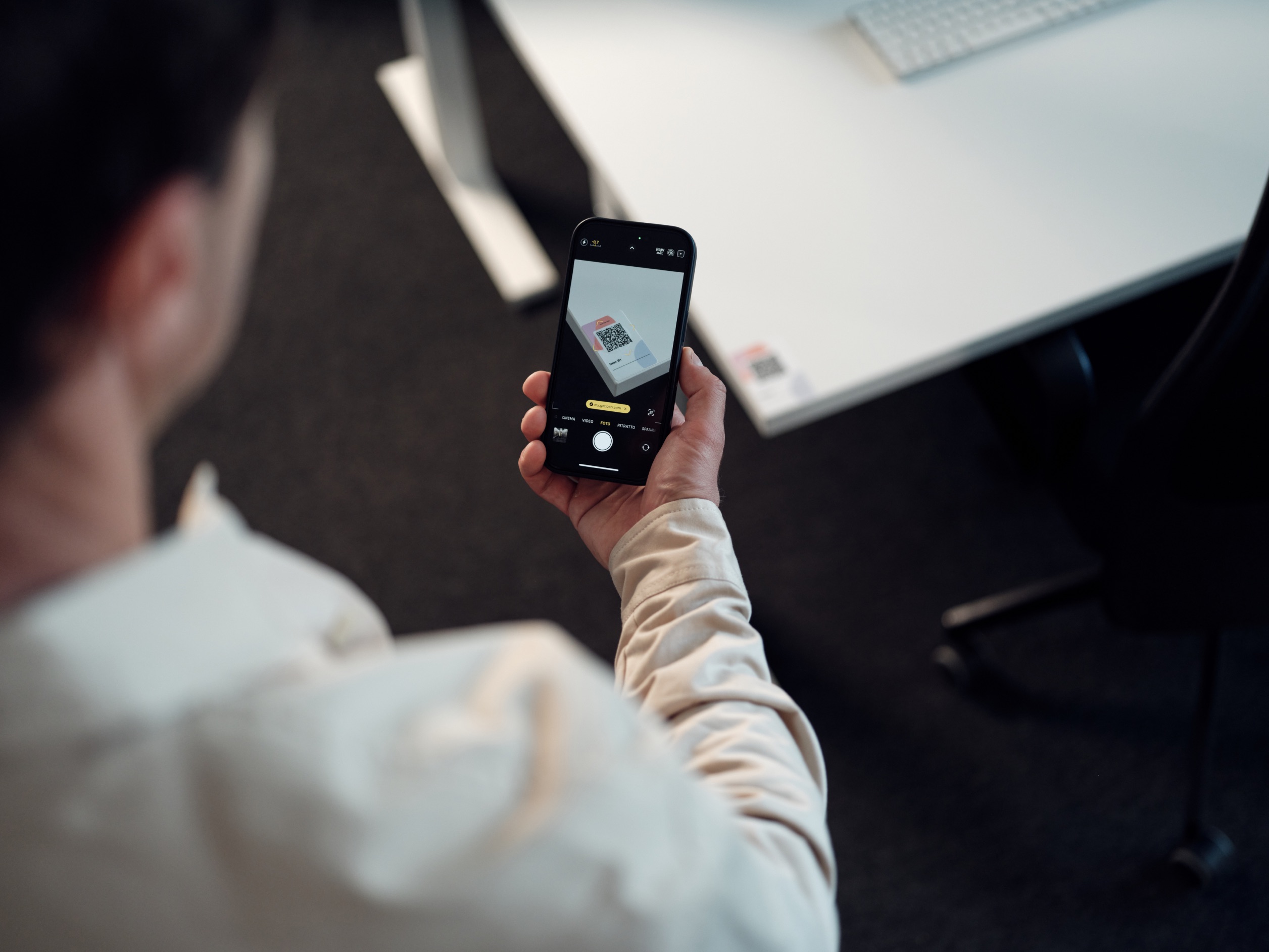 Colleagues booking desks in a flexible office