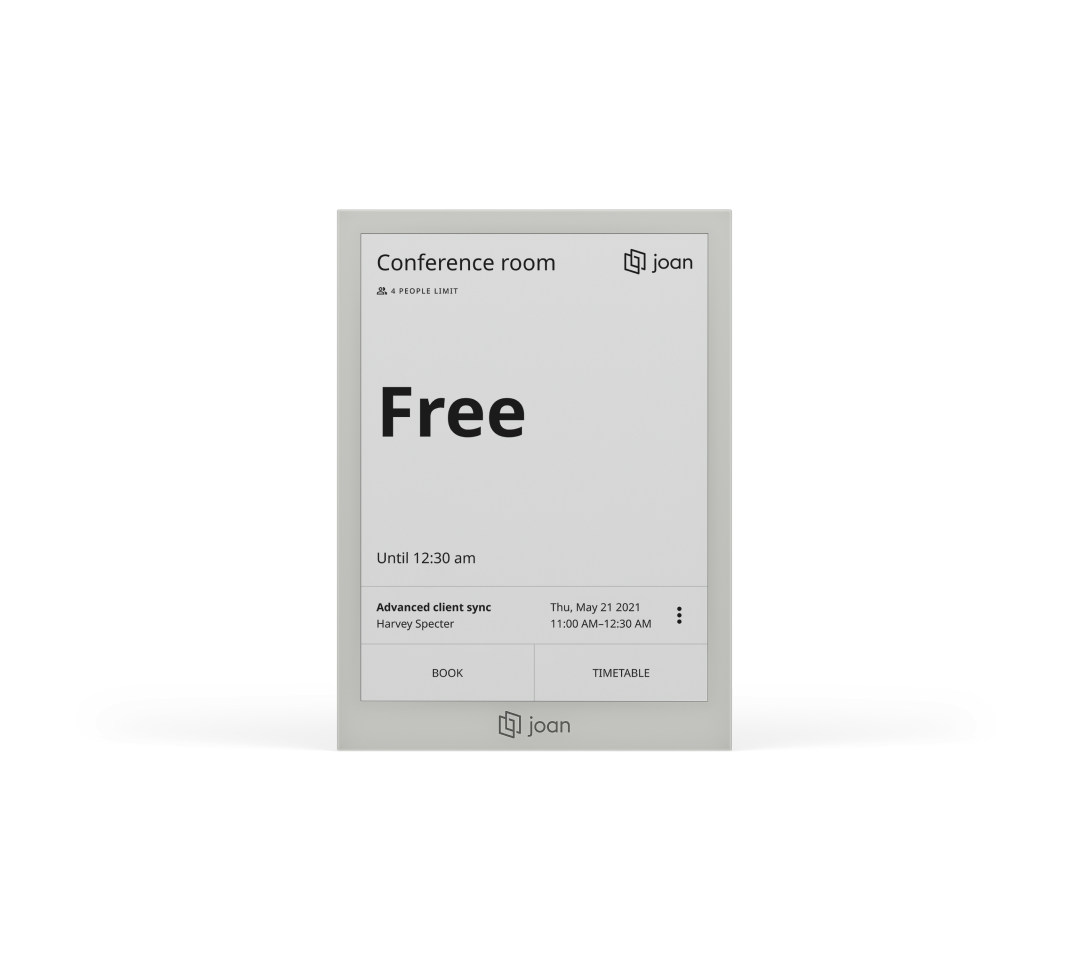 Joan 6 Pro e-ink display showing a conference room status as 'Free' with booking and timetable options.