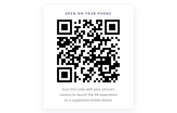 QR code prompt to open an AR experience on a mobile phone, with instructions to scan using a phone camera.