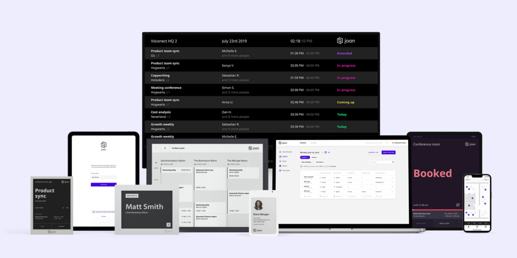 Joan workplace management platform shown across monitor, e-ink displays, tablet, laptop, and smartphone screens.