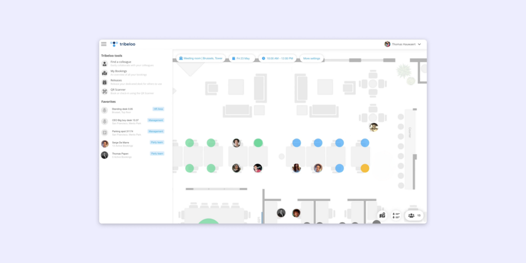 Tribeloo desk booking software interface showing a color-coded office floor plan with team assignments and availability indicators.